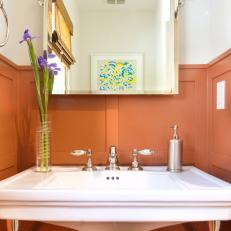 Small Bathroom With Chic Orange Wainscoting