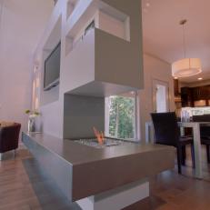 Modern Gray Structural Room Divider With Fireplace and Shelving 