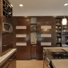 Mid-Century Modern Kitchen With Wooden Cabinets, Sleek Design and Sliding Door Storage