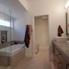 Modern Spa Bathroom With Square White Sinks, Glass Shower and Soaking Tub