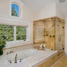 Elegant Master Bathroom With Golden Tile
