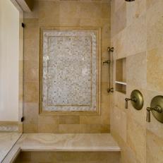 Neutral Tile Shower With Antique Gold Plumbing
