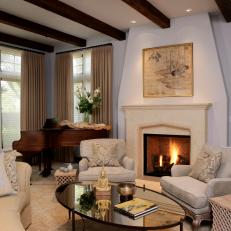 Traditional Living Room With Dark Wood Ceiling Beams