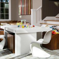 Contemporary Playroom With Mod White Chairs and Wooden Storage Bins 
