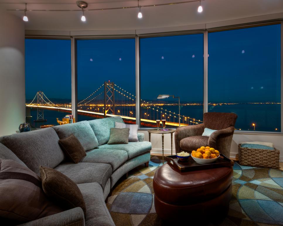 Contemporary Curved Living Room With Gorgeous Night View | HGTV