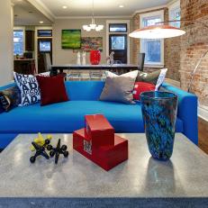 Eclectic Living Room With Modern Blue Sofa