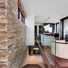 Stacked Stone Warms Up Contemporary Stairway