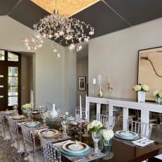 Contemporary Dining Room With Floral Chandelier