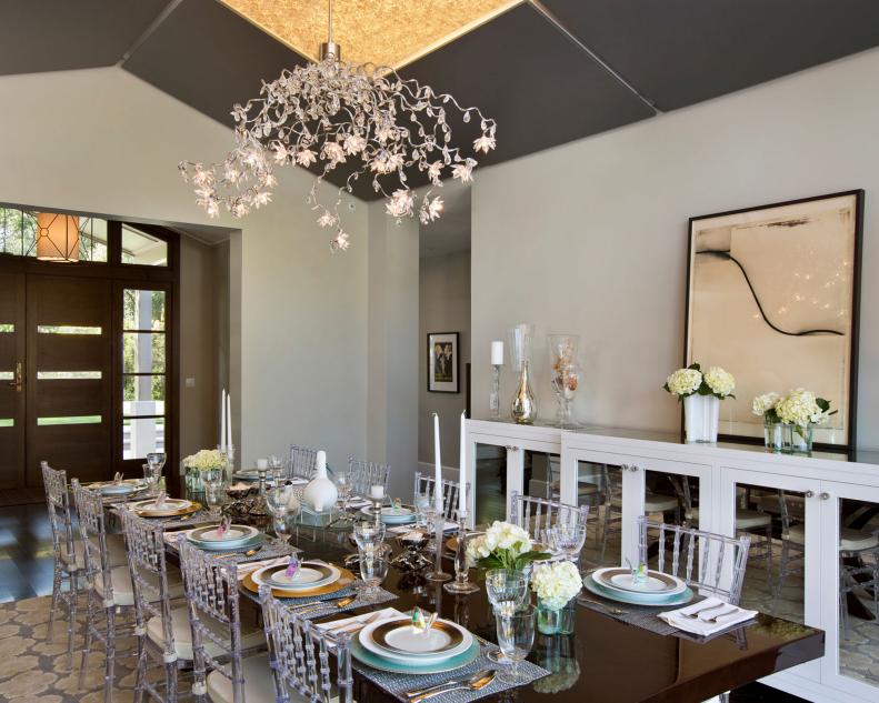 Gray and Neutral Dining Room With Brown Table & Acrylic Chairs