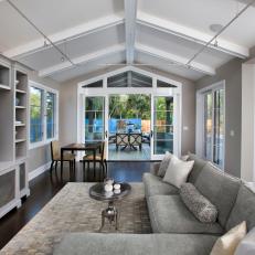 Chic Coastal Inspired Family Room With Vaulted Ceilings