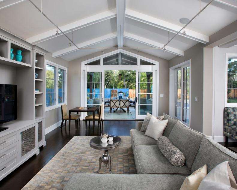 Gray Contemporary Living Room With White Vaulted Ceilings