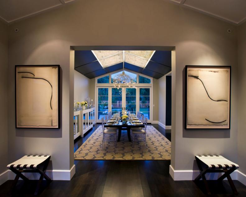 Gray Dining Room With Vaulted Ceiling & Dark Brown Hardwood Floor