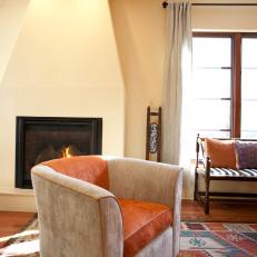 Neutral Southwestern Sitting Room With Orange Accents