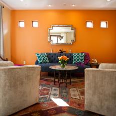 Moroccan-Inspired Sitting Room With Bold Orange Wall