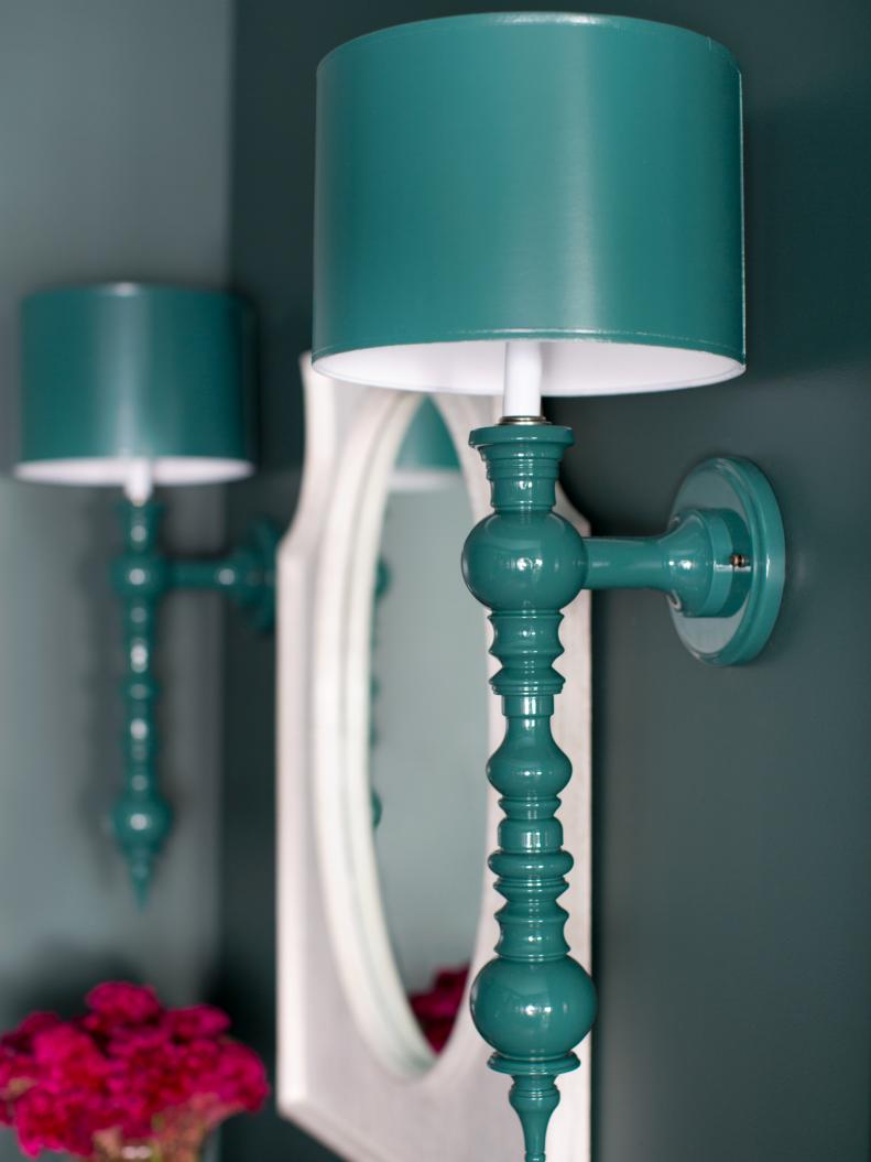 Too short on space for table lamps or floor lamps? Go with wall sconces instead! Not only can wall sconces lighten and brighten dark hallways and entryways, they can truly turn dead space into a strong focal point.