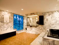 luxurious bathroom with blue shower lights