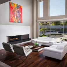 Streamlined Modern Living Room With Colorful Artwork