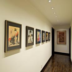Off-White Hallway Lined With Asian Artwork