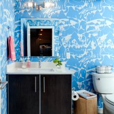 Eclectic Powder Room With Bright Blue Wallpaper