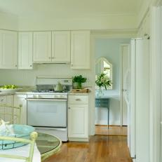 Fresh White Cottage Kitchen With Hardwood Floors 