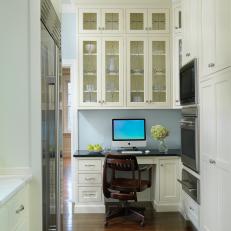 Traditional Kitchen Office Space With White Cabinets