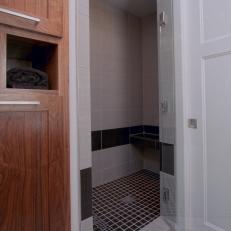 Neutral Tile Walk-In Shower With Glass Door