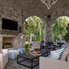 Elaborate Outdoor Living Room With Stone Walls