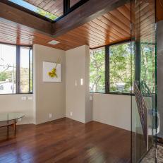 Contemporary Studio With Wood Paneled Ceilings