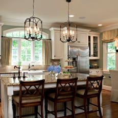 Traditional Eat-In Kitchen With Brown Wood Barstools