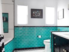 Bathroom With Teal Backsplash, Black Vanity, Two Windows