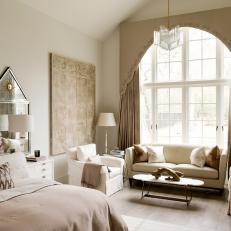 Soft Beige Bedroom Features Elegant Sitting Area