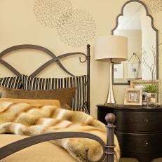 Transitional Guest Room Features Attractive Metal Bed Frame