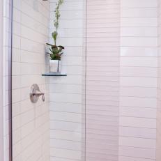 Modern Frameless Glass Shower Features White Subway Tile With Updated Fixtures