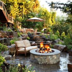 Secluded Backyard Patio With Stone Fire Pit