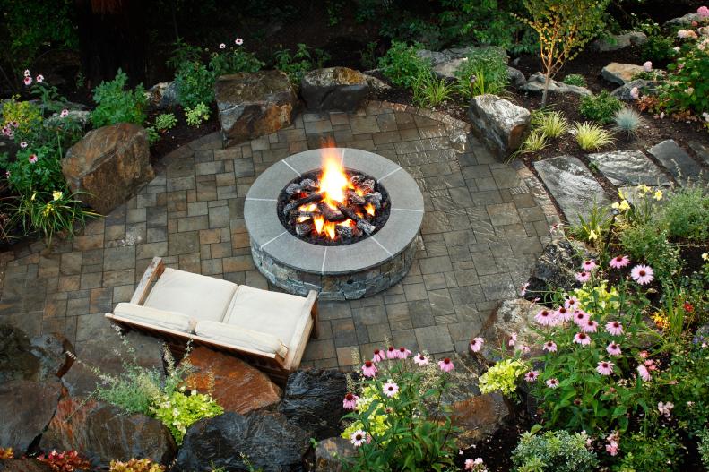 Overhead View of Gray Stone Patio With Round Fire Pit