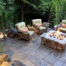 Cozy Backyard Patio With Stone Fire Pit