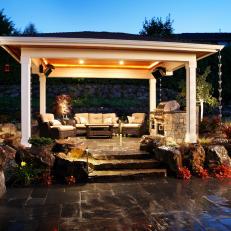 Serene Backyard Patio With Covered Sitting Area