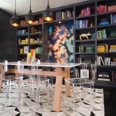 Sleek Modern Dining Room With Multicolored Book Display