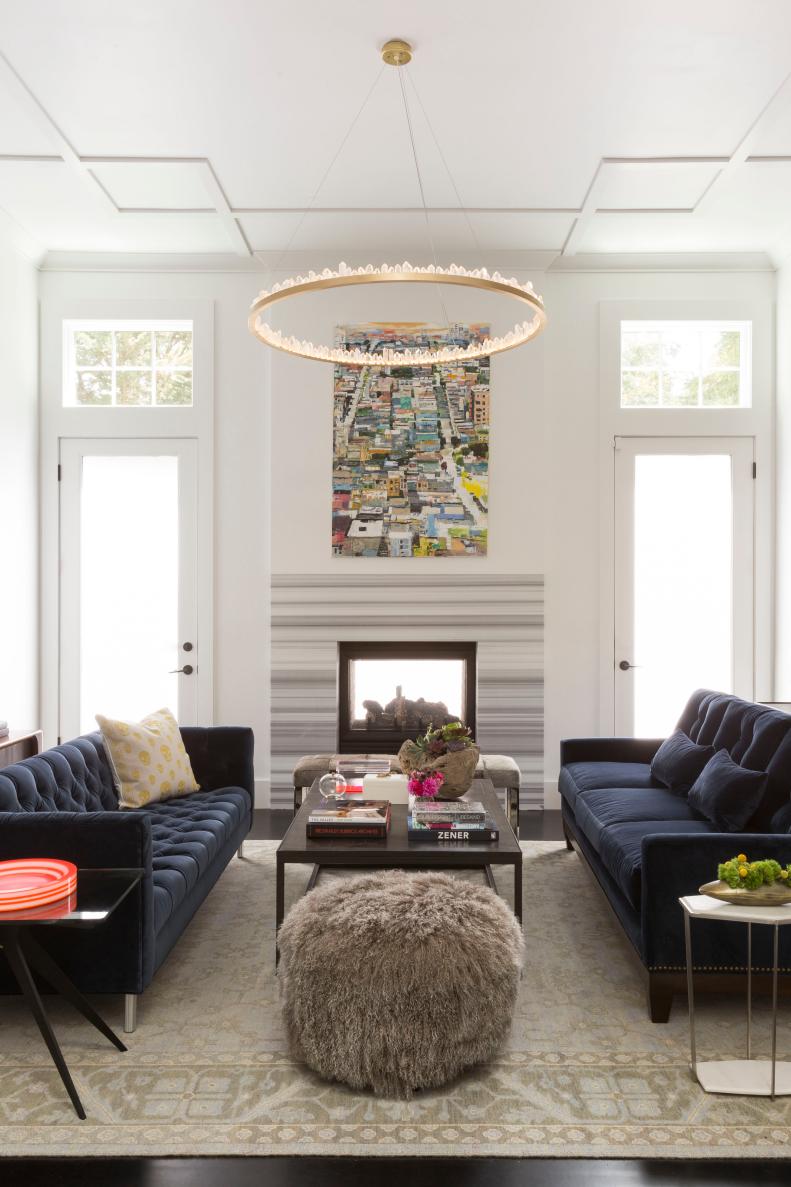 White Modern Living Room With Navy Velvet Sofas