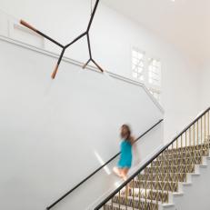 Modern White Stairwell With Skylight