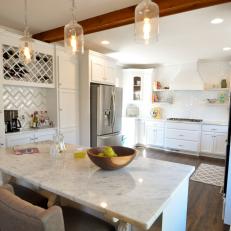 Transitional Kitchen Features Smart Cabinet Storage & Marble-Topped Island