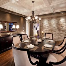 Traditional Elegant Dining Room With Chandelier, Paneled Ceiling and Cultured Stone Accent Wall 
