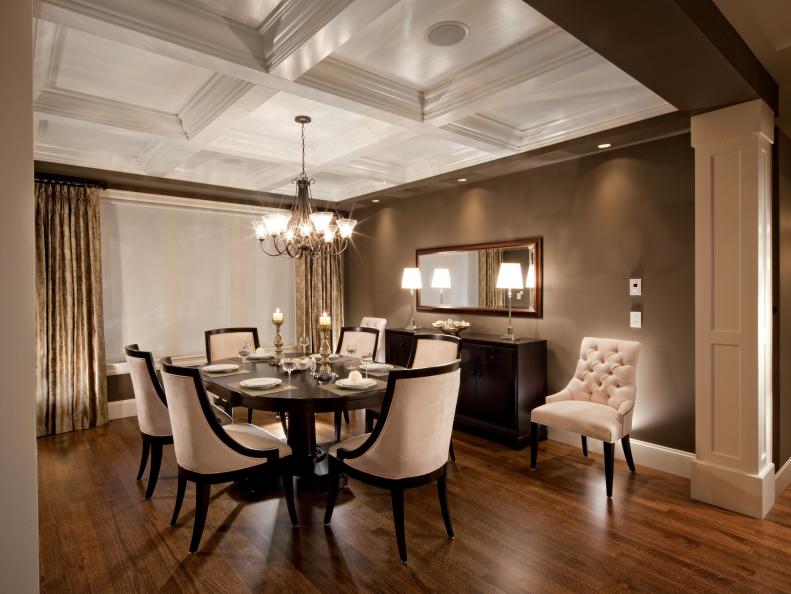 Traditional Brown Dining Room With Hardwood Floor & Neutral Chairs 