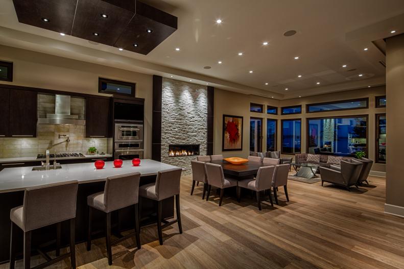 Open Contemporary Layout With Stone Accent Wall and Drop Ceiling