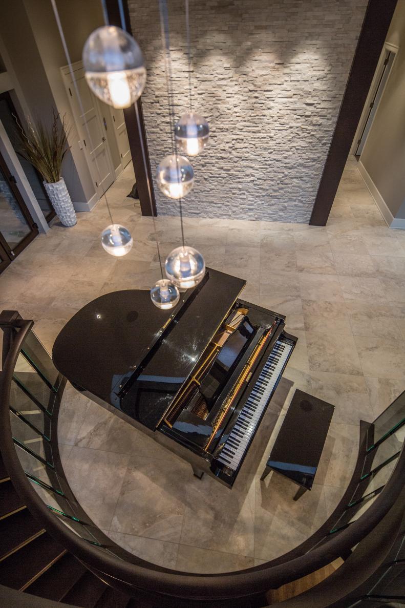 Contemporary Foyer With Piano & Cultured Stone Accent Wall 