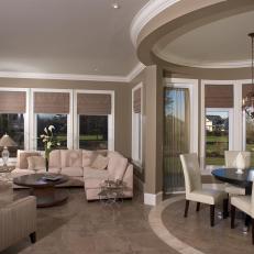 Contemporary Neutral Living Room Connected to Circular Dining Nook