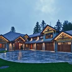 Gorgeous Craftsman Home With Stone Siding, Decorative Wood Beams and Wooden Doors 