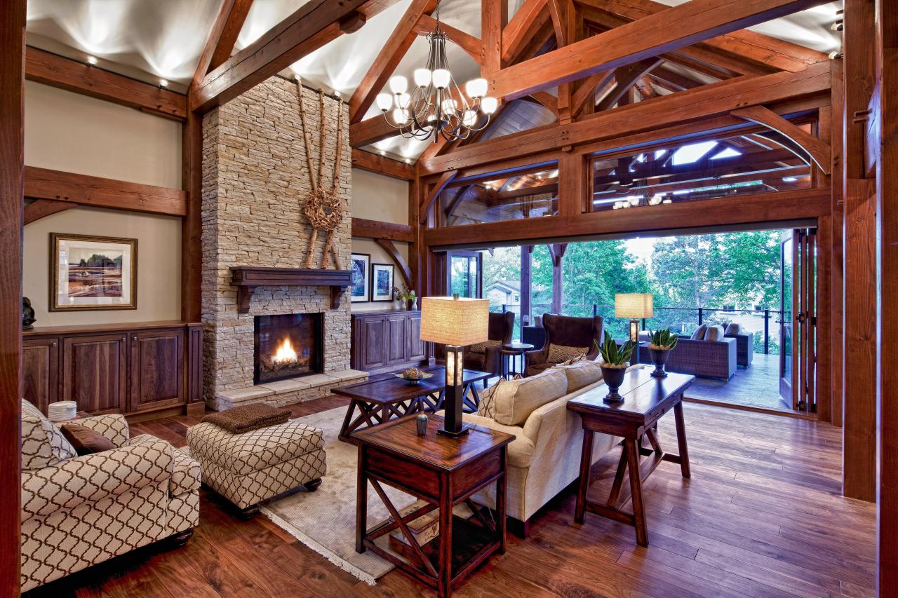 Inviting Traditional Living Room With Intricate Ceiling Beams And Inviting Traditional Living Room With Intricate Ceiling Beams And Tall Stone Fireplace