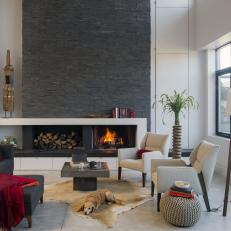 Modern Living Room With Gray Stone Fireplace Surround