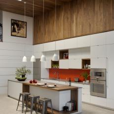 Modern Kitchen With Warm Wood Paneling